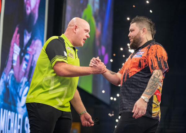 Michael van Gerwen celebrated a record-breaking third consecutive nightly win in the  Premier League