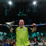 Michael van Gerwen lifts the 2023 Premier League title.