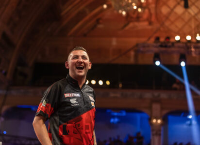 Nathan Aspinall all smiles in the Final