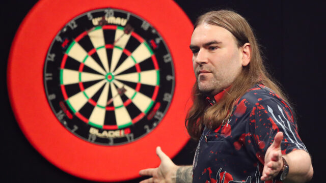 Super Searle pins the 9 and the defending champions is dumped out on a magic Monday at the Grand Slam 