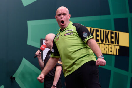 Michael van Gerwen celebrates at the Dutch Darts Masters.