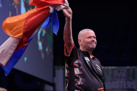 Raymond van Barneveld celebrates his Dutch Darts Masters victory over Rob Cross.
