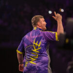 Luke Littler on stage at the 2024 Premier League Darts