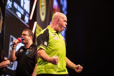 Michael van Gerwen on stage in the 2024 BetMGM Premier League Darts