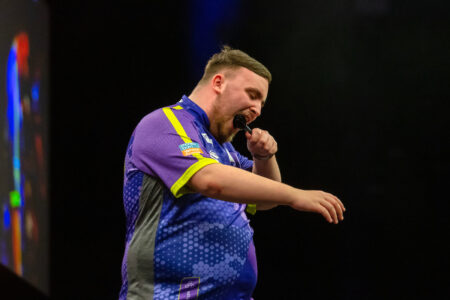 Luke Littler on stage during the 2024 BetMGM Premier League Darts
