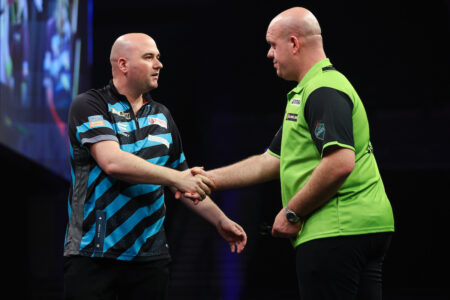 Michael van Gerwen and Rob Cross on stage in the 2024 BetMGM Premier League Darts.