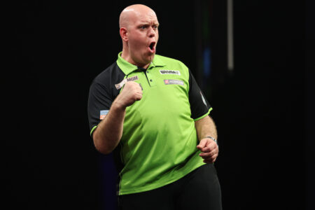Michael van Gerwen on stage during the 2024 BetMGM Premier League Darts.