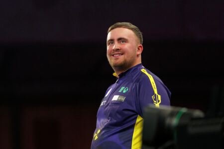 Luke Littler on stage at the Paddy Power World Darts Championship.