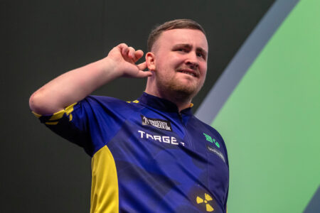 Luke Littler on stage at the 2025 Paddy Power World Darts Championship. Credit: PDC