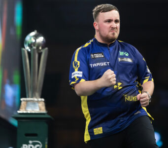 Luke Littler on stage at the 2025 Paddy Power World Darts Championship.