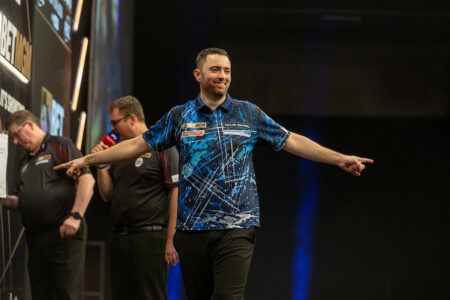 Luke Humphries on stage at the 2025 Premier League Darts.