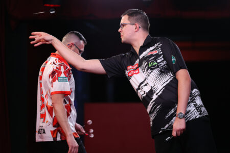Gian van Veen playing on stage at the 2025 UK Open.