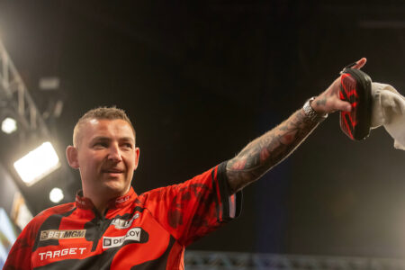 Nathan Aspinall playing Premier League Darts in 2025