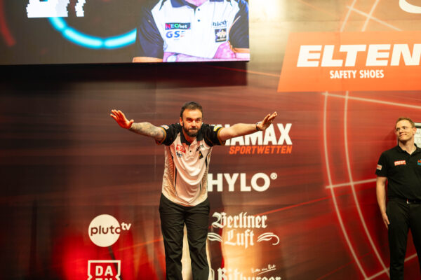 Smith dazzles and van Veen sets up Anderson clash on day one at the European Darts Grand Prix.