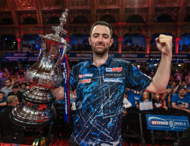 Luke Humphries celebrates his 2024 Betfred World Matchplay win.