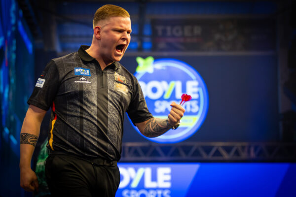 Littler Shines in opening World Grand Prix match as Michael Van Gerwen suffers shock defeat