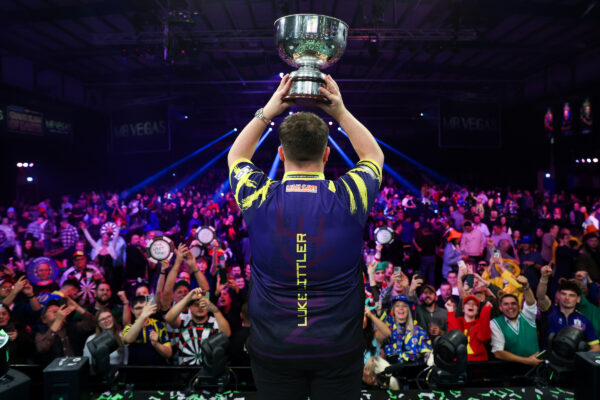 Littler Defeats Humphries to Retain Grand Slam Title and Become World Number One