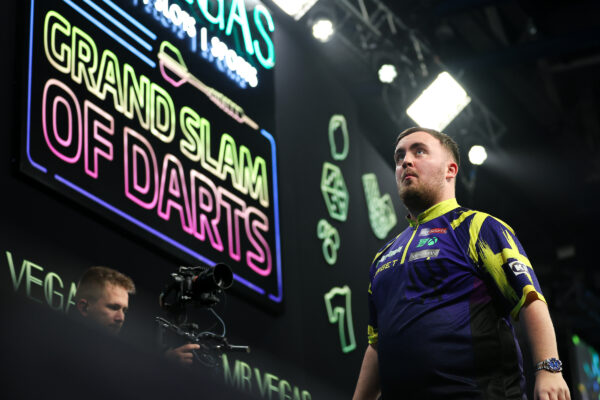 Littler Launches Grand Slam Title Defence as Smith Returns Victorious in Emotional Opening Day