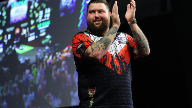 Littler Launches Grand Slam Title Defence as Smith Returns Victorious in Emotional Opening Day