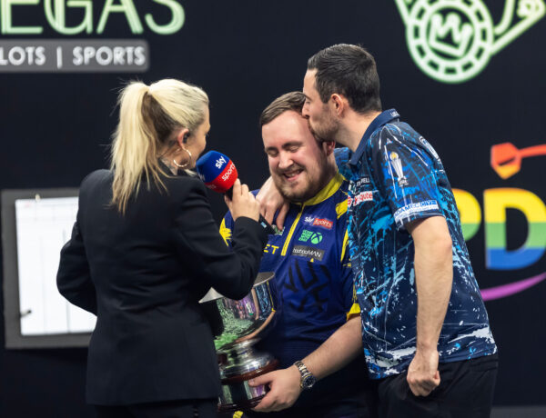 Littler Defeats Humphries to Retain Grand Slam Title and Become World Number One