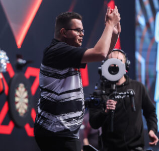 Gian van Veen on stage at the 2026 Winmau World Masters.