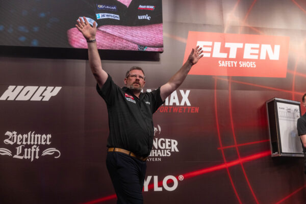 Michael Van Gerwen struggles on a drama-filled day two at the International Darts Open