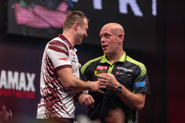 Michael Van Gerwen struggles on a drama-filled day two at the International Darts Open